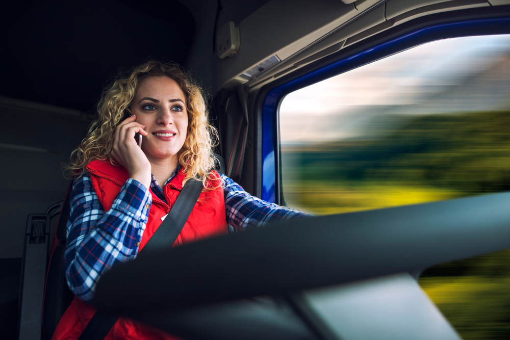 Truck driver talking on the phone while driving