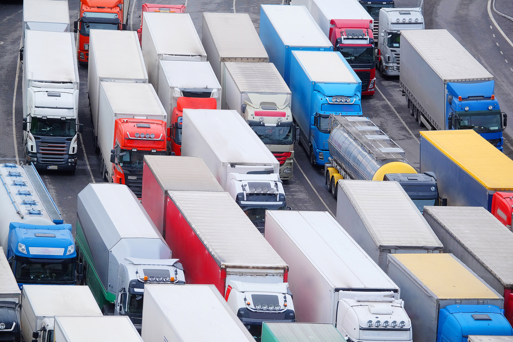 trucks lined up on interstate